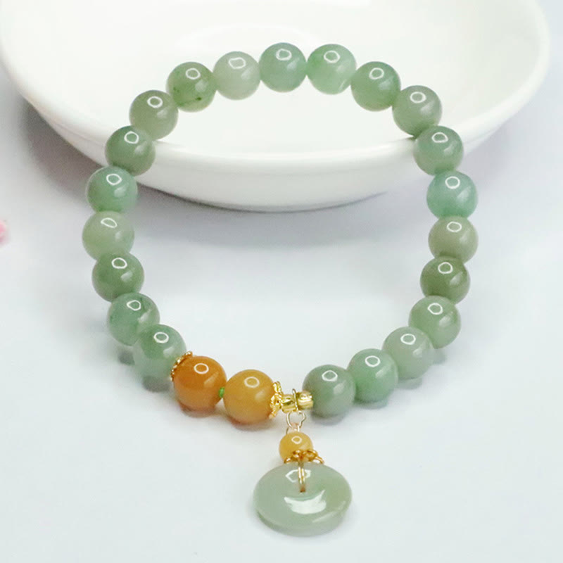 Bracelet de prospérité et d'abondance en perles de jade et Buddha Stones