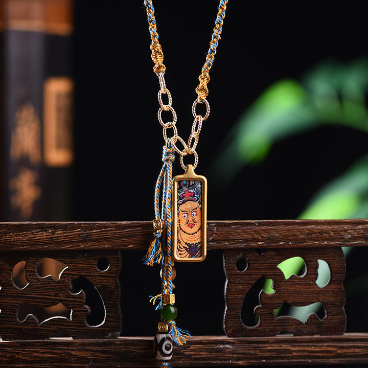 Buddha Stones pendentif Thangka en acier titane représentant le dieu de la richesse du Tibet