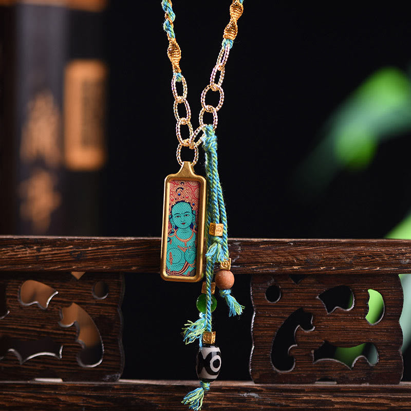 Buddha Stones pendentif Thangka en acier titane représentant le dieu de la richesse du Tibet