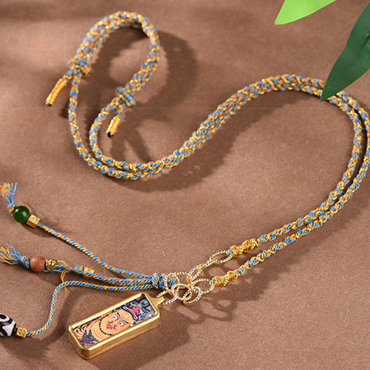 Buddha Stones pendentif Thangka en acier titane représentant le dieu de la richesse du Tibet