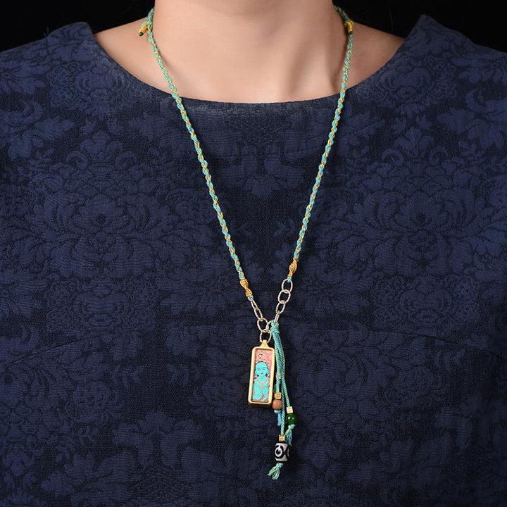 Buddha Stones pendentif Thangka en acier titane représentant le dieu de la richesse du Tibet