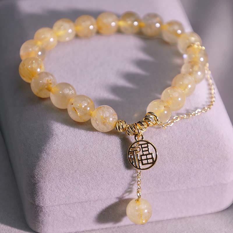 Bracelet porte-bonheur en Buddha Stones et citrine avec personnage Lucky Fu