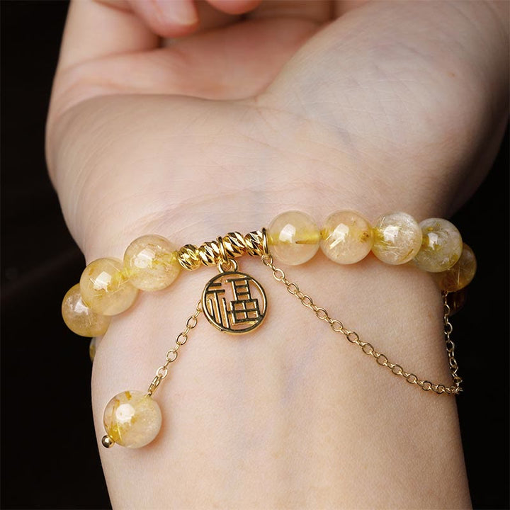 Bracelet porte-bonheur en Buddha Stones et citrine avec personnage Lucky Fu