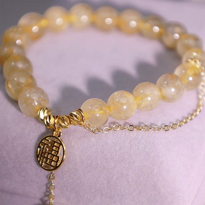 Bracelet porte-bonheur en Buddha Stones et citrine avec personnage Lucky Fu