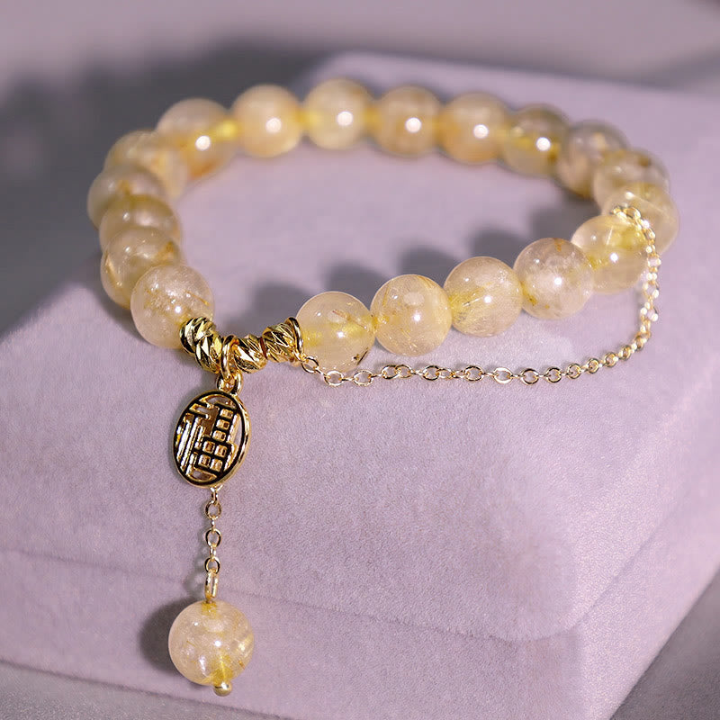 Bracelet porte-bonheur en Buddha Stones et citrine avec personnage Lucky Fu