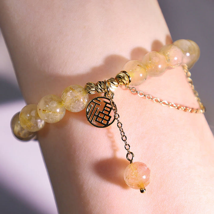 Bracelet porte-bonheur en Buddha Stones et citrine avec personnage Lucky Fu
