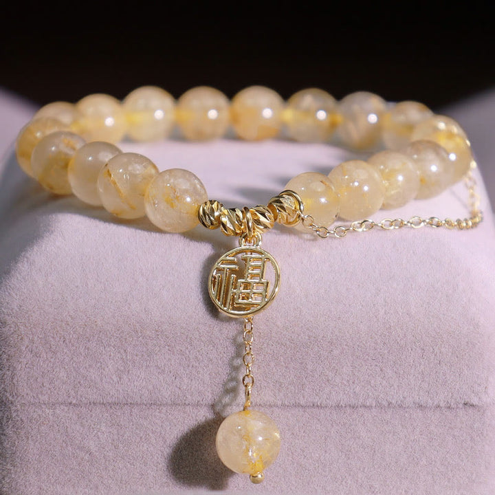 Bracelet porte-bonheur en Buddha Stones et citrine avec personnage Lucky Fu