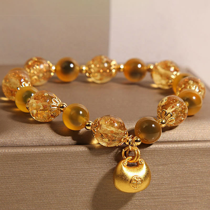 Bracelet de guérison en agate jaune bonbon avec Buddha Stones et personnage Fu