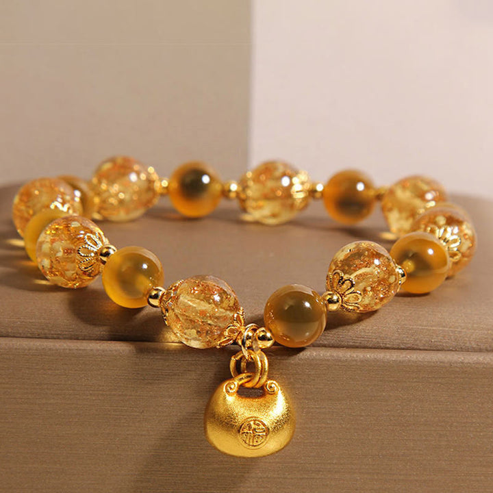 Bracelet de guérison en agate jaune bonbon avec Buddha Stones et personnage Fu