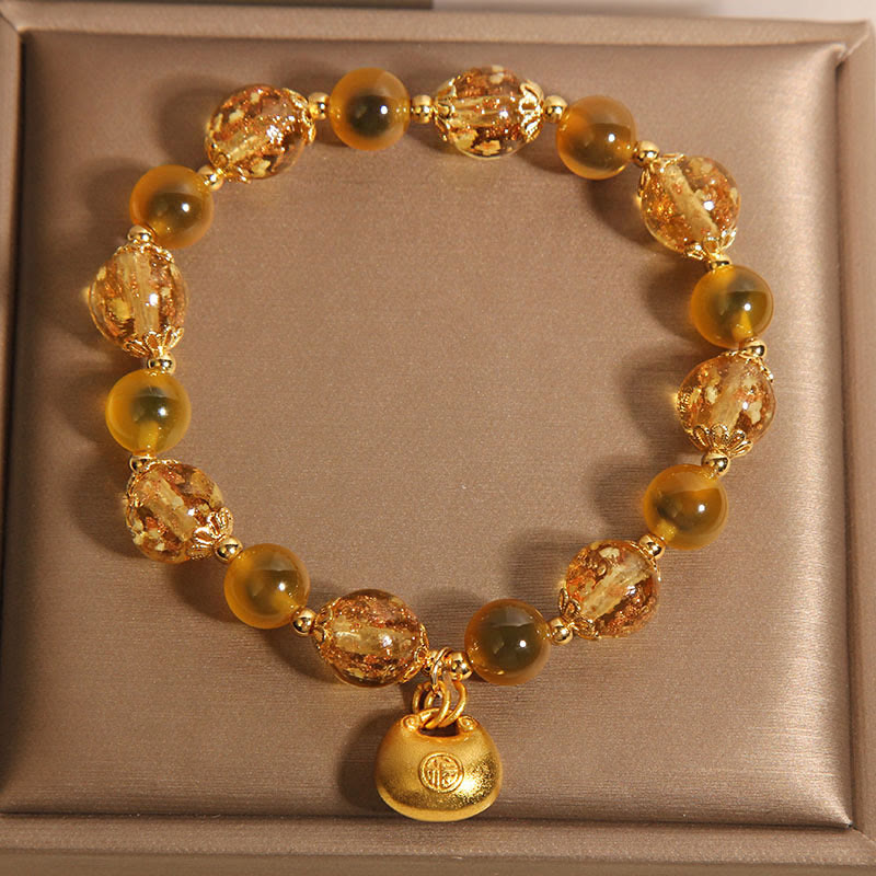 Bracelet de guérison en agate jaune bonbon avec Buddha Stones et personnage Fu