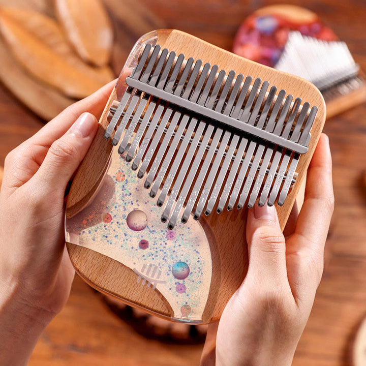 Kalimba 17/21 Buddha Stones en bois de hêtre, piano à pouce portable, planète univers