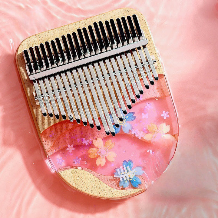 Kalimba 17/21 Buddha Stones en bois de hêtre et cerisier rose, piano à pouces portable