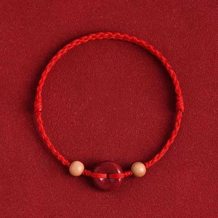 Bracelet de cheville en corde de richesse en cinabre avec boucle de paix en bois de pêcher et Buddha Stones