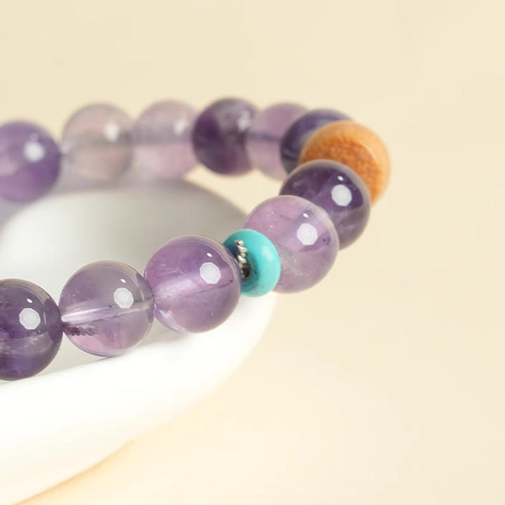Bracelet de paix en perles de bois porte-bonheur en améthyste naturelle et Buddha Stones