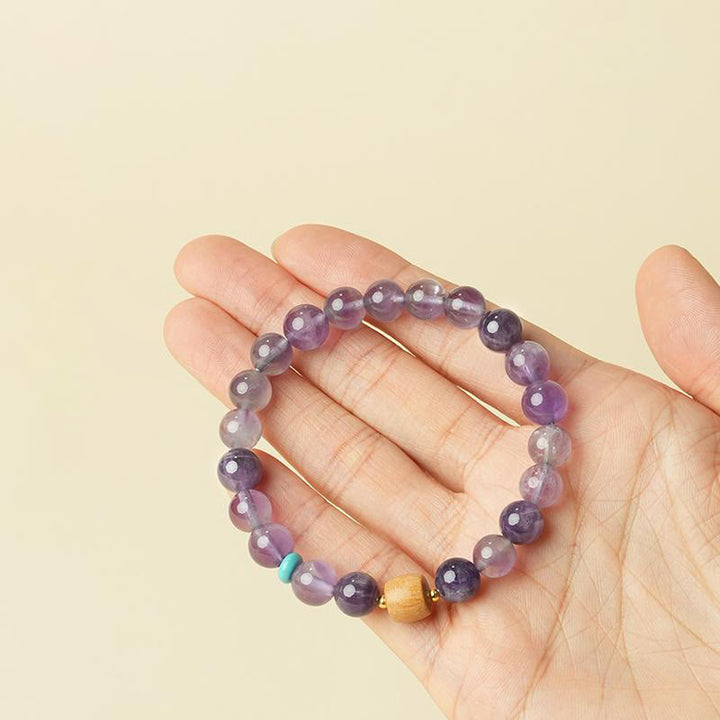 Bracelet de paix en perles de bois porte-bonheur en améthyste naturelle et Buddha Stones