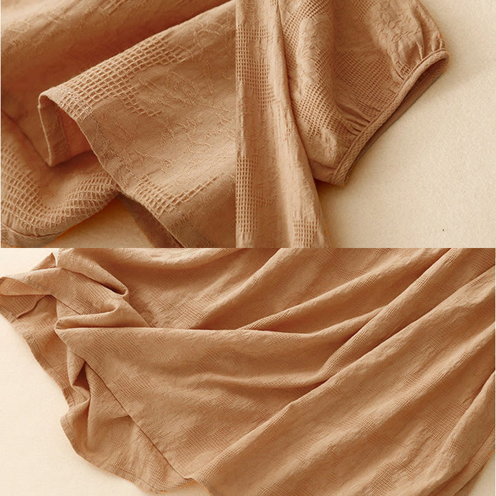 Robe mi-longue d'été en coton à manches courtes et col ras du cou avec poignets élastiques et jacquard uni Buddha Stones