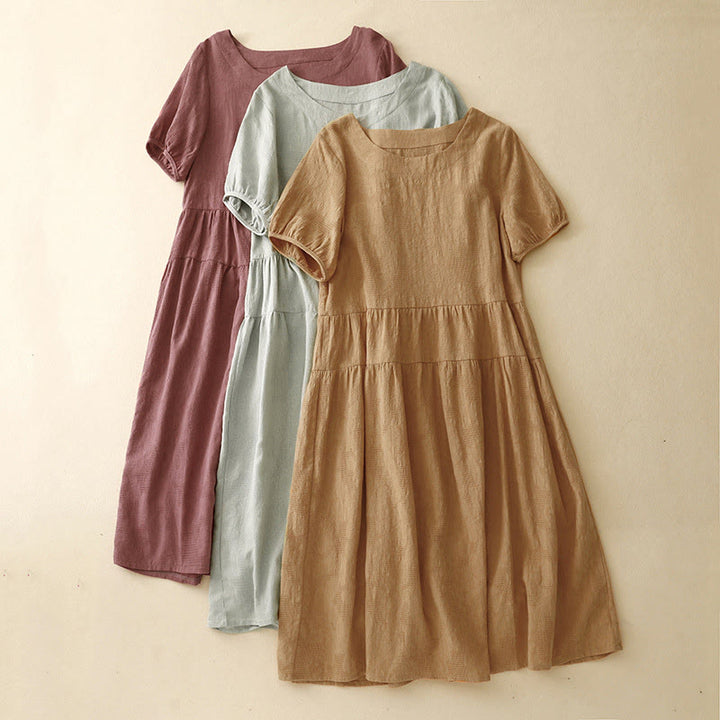 Robe mi-longue d'été en coton à manches courtes et col ras du cou avec poignets élastiques et jacquard uni Buddha Stones