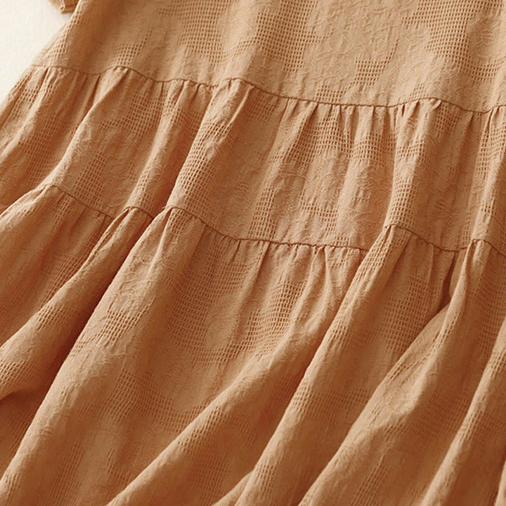 Robe mi-longue d'été en coton à manches courtes et col ras du cou avec poignets élastiques et jacquard uni Buddha Stones