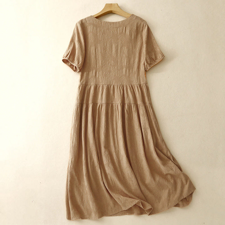 Robe mi-longue d'été en coton à manches courtes et col ras du cou avec poignets élastiques et jacquard uni Buddha Stones