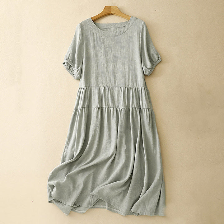 Robe mi-longue d'été en coton à manches courtes et col ras du cou avec poignets élastiques et jacquard uni Buddha Stones
