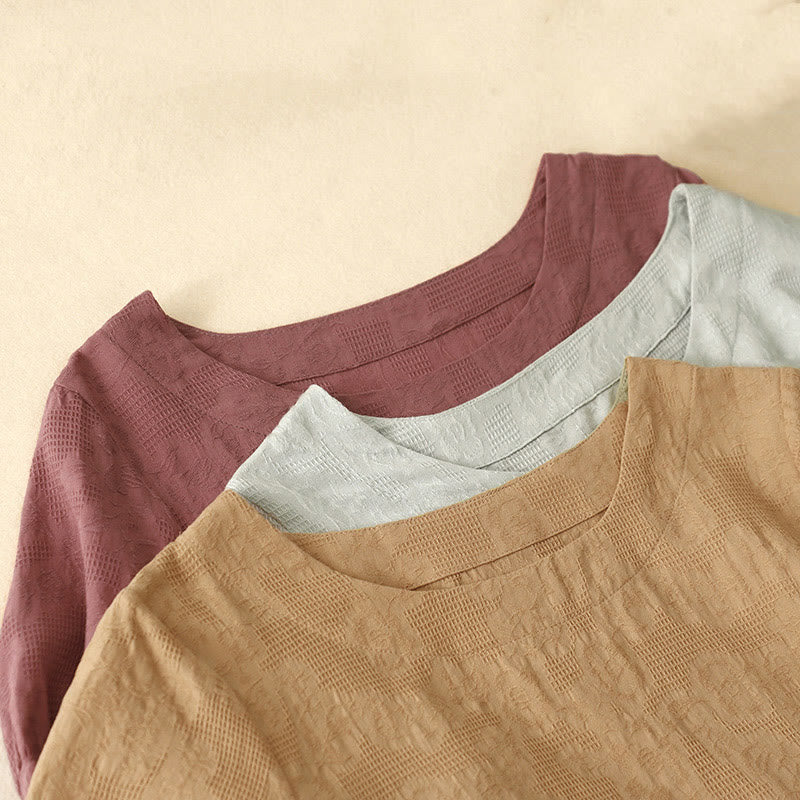 Robe mi-longue d'été en coton à manches courtes et col ras du cou avec poignets élastiques et jacquard uni Buddha Stones