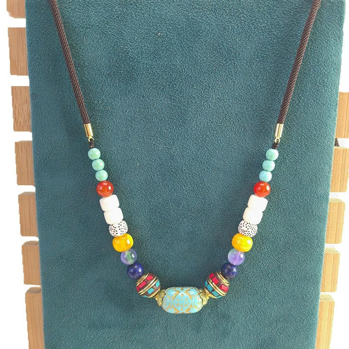 Collier pendentif en perles turquoises tibétaines faites à la main avec Buddha Stones - image 7