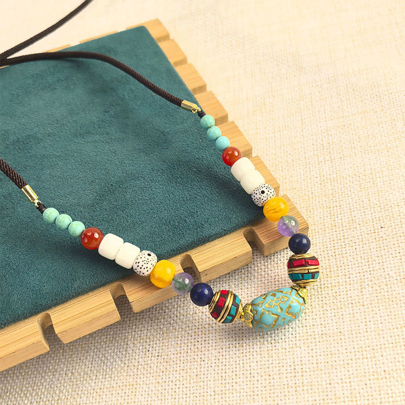 Collier pendentif en perles turquoises tibétaines faites à la main avec Buddha Stones - image 1