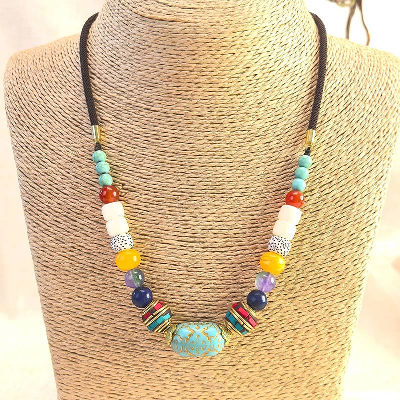 Collier pendentif en perles turquoises tibétaines faites à la main avec Buddha Stones