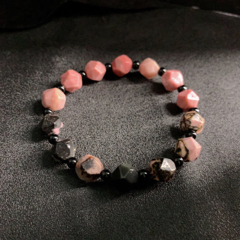 Bracelet de guérison en perles polygonales en pierre de Buddha Stones naturelle à lignes noires et à taches rouges