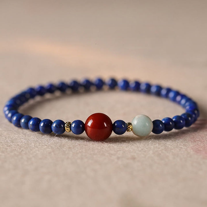 Bracelet positif en perles ultra-fines de lazurite, lapis-lazuli et agate, composé de petites Buddha Stones de positivité - image 0