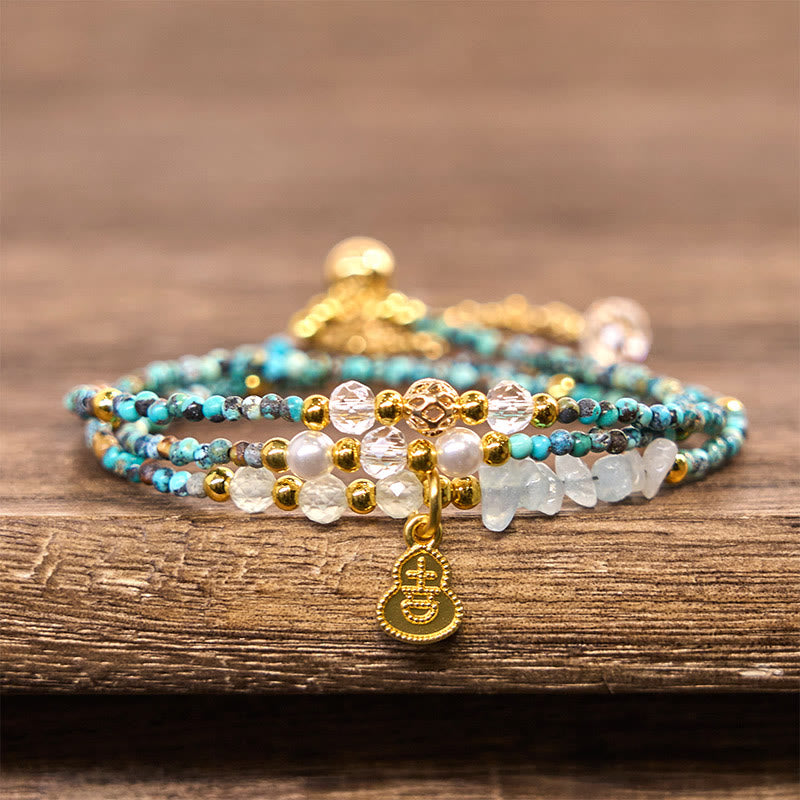 Bracelet triple tour en perles turquoise Buddha Stones