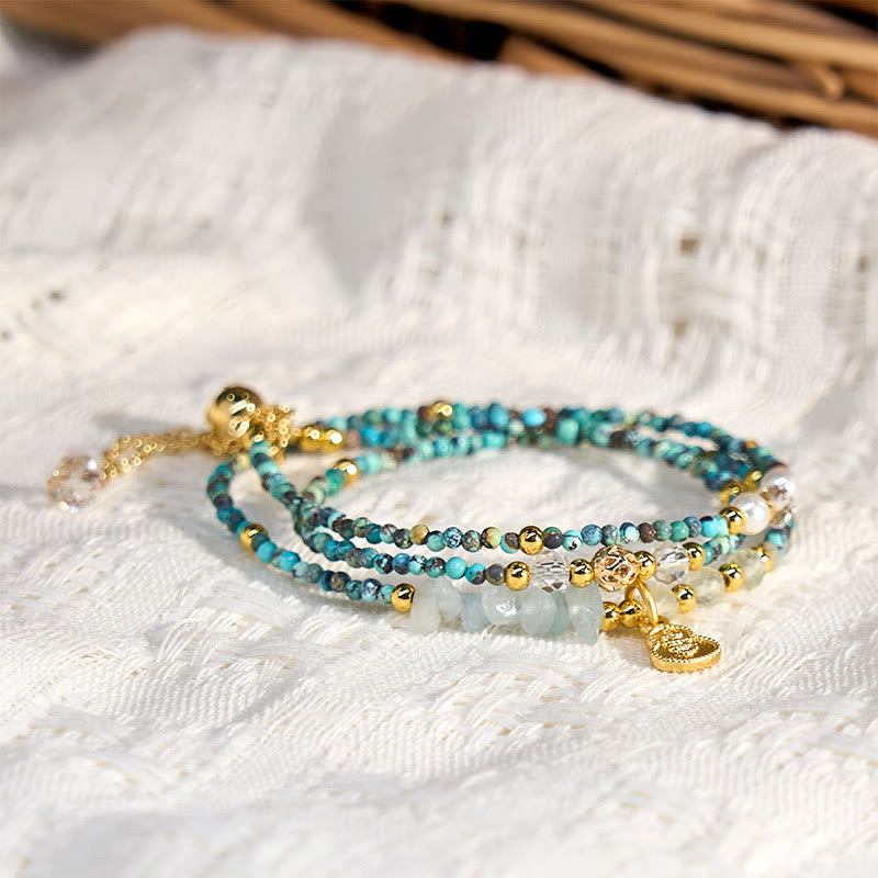 Bracelet triple tour en perles turquoise Buddha Stones