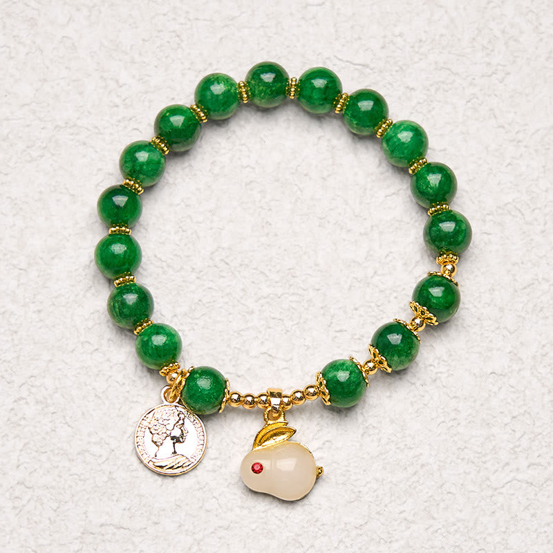 Bracelet en calcite verte et Buddha Stones avec breloque en forme de lapin