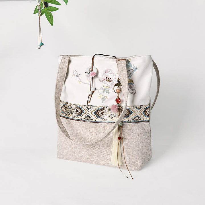 Sac à bandoulière en toile polyester brodé Buddha Stones Magnolia