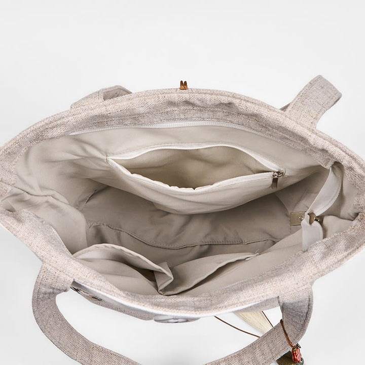 Sac à bandoulière en toile polyester brodé Buddha Stones Magnolia