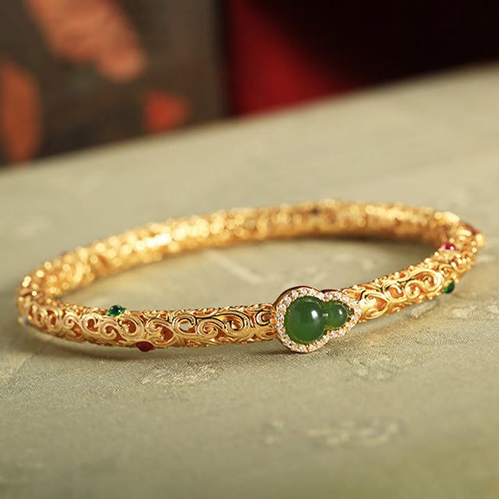 Bracelet porte-bonheur en Buddha Stones , jade cyan, cuivre plaqué or, nuages de bon augure, gourde