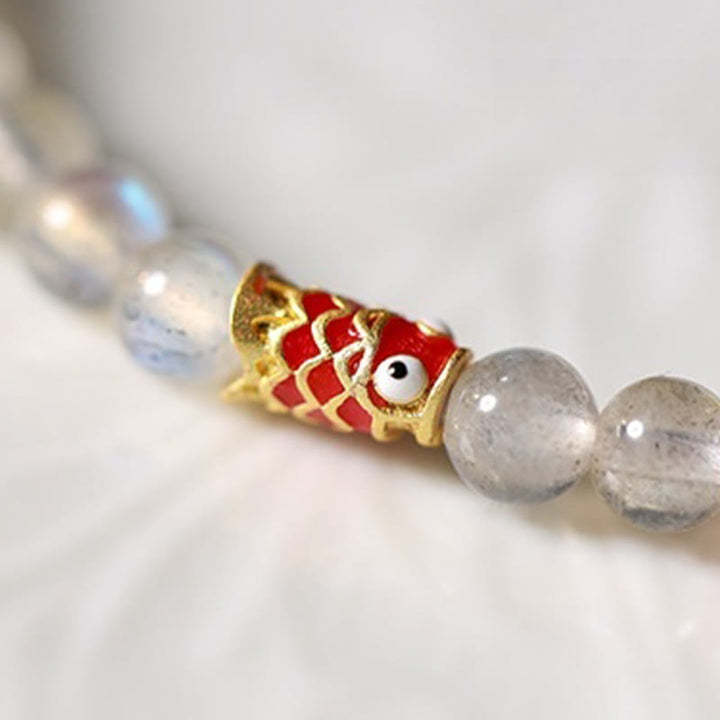 Bracelet de guérison ultra-fin en pierre de lune et poisson koï Buddha Stones