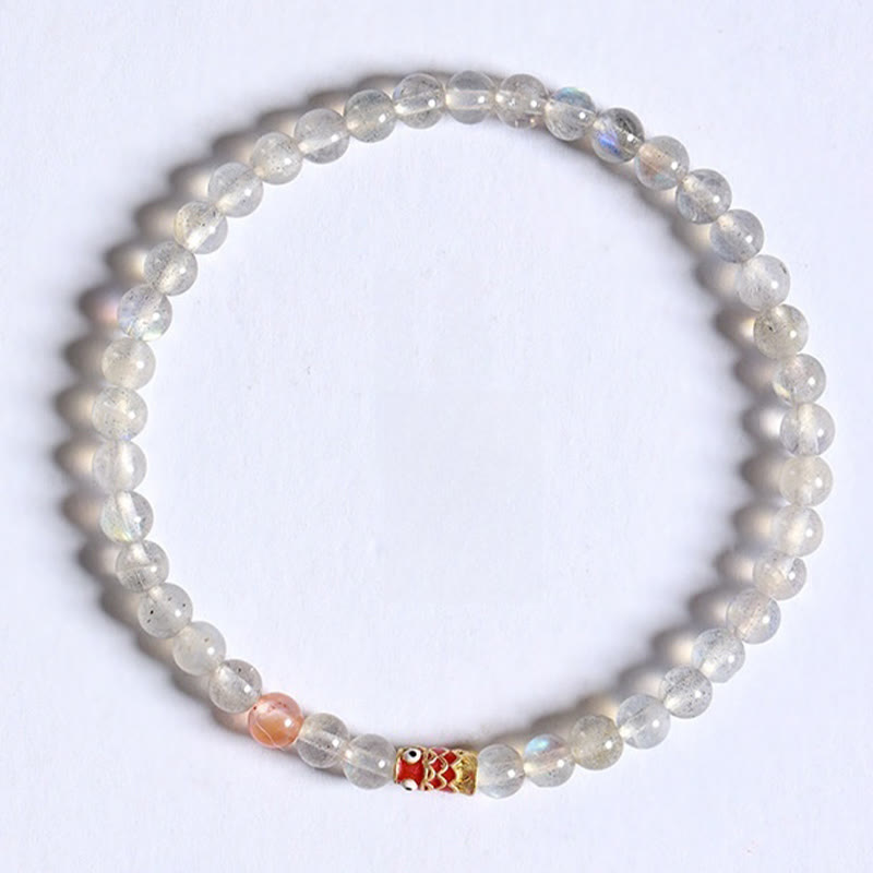 Bracelet de guérison ultra-fin en pierre de lune et poisson koï Buddha Stones