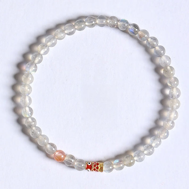 Bracelet de guérison ultra-fin en pierre de lune et poisson koï Buddha Stones