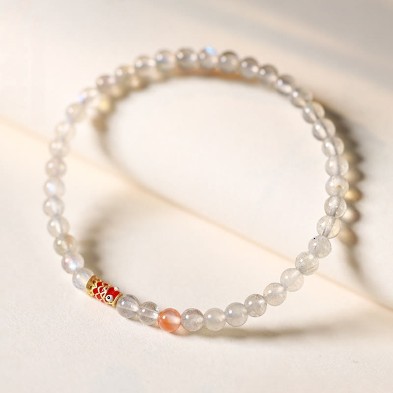 Bracelet de guérison ultra-fin en pierre de lune et poisson koï Buddha Stones