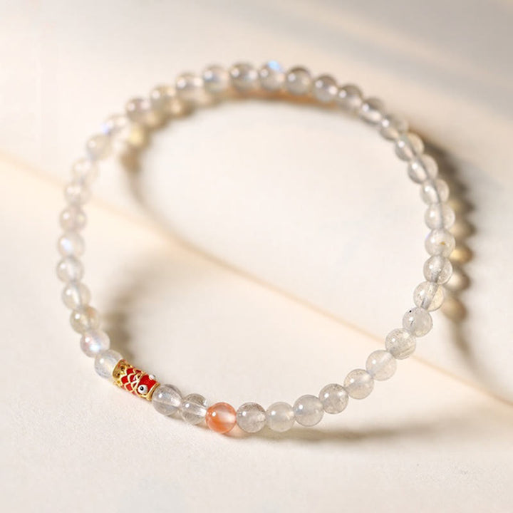 Bracelet de guérison ultra-fin en pierre de lune et poisson koï Buddha Stones