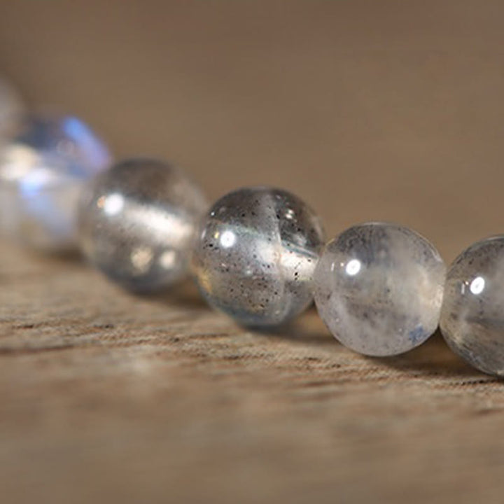 Bracelet de guérison ultra-fin en pierre de lune et poisson koï Buddha Stones