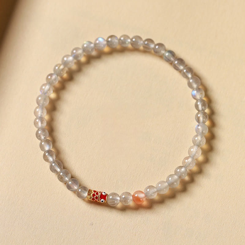 Bracelet de guérison ultra-fin en pierre de lune et poisson koï Buddha Stones