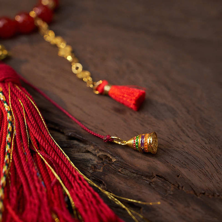 Mala de poignet calme en agate rouge et Buddha Stones , 18 perles en cuivre et pompon tibétain
