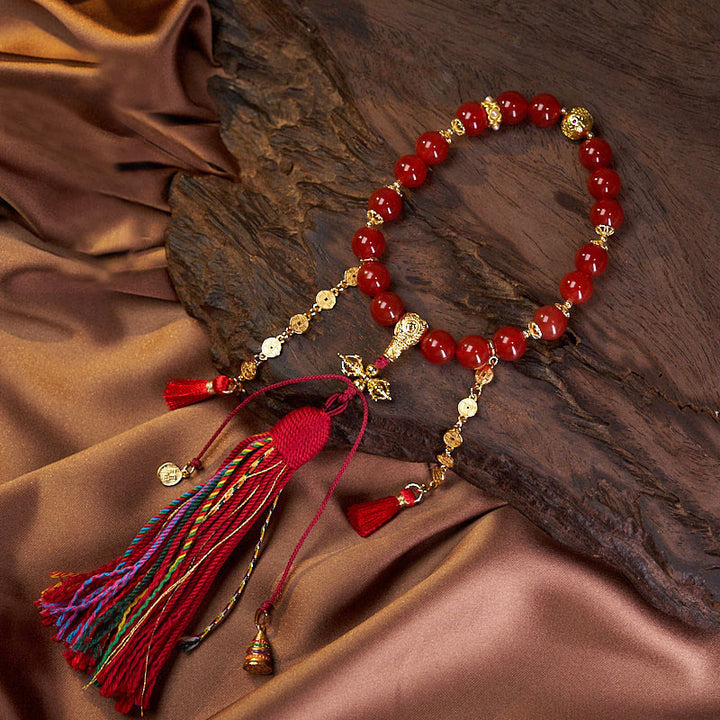 Mala de poignet calme en agate rouge et Buddha Stones , 18 perles en cuivre et pompon tibétain