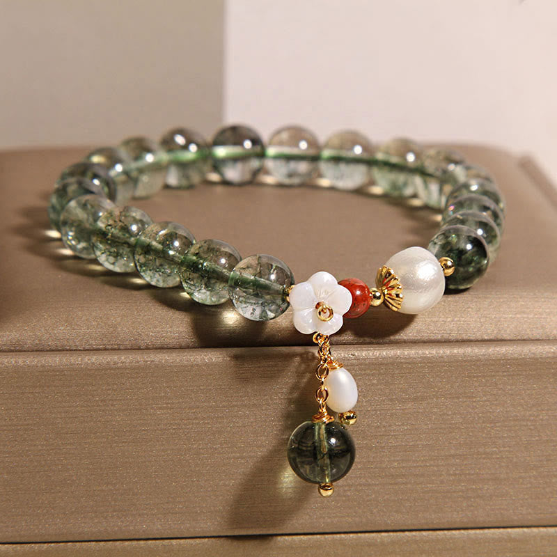 Bracelet Buddha Stones en perles fantômes vertes naturelles, coquillages et fleurs positives