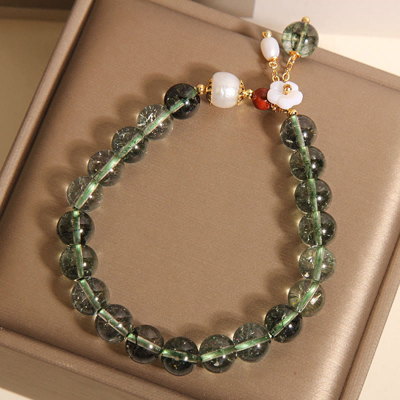 Bracelet Buddha Stones en perles fantômes vertes naturelles, coquillages et fleurs positives