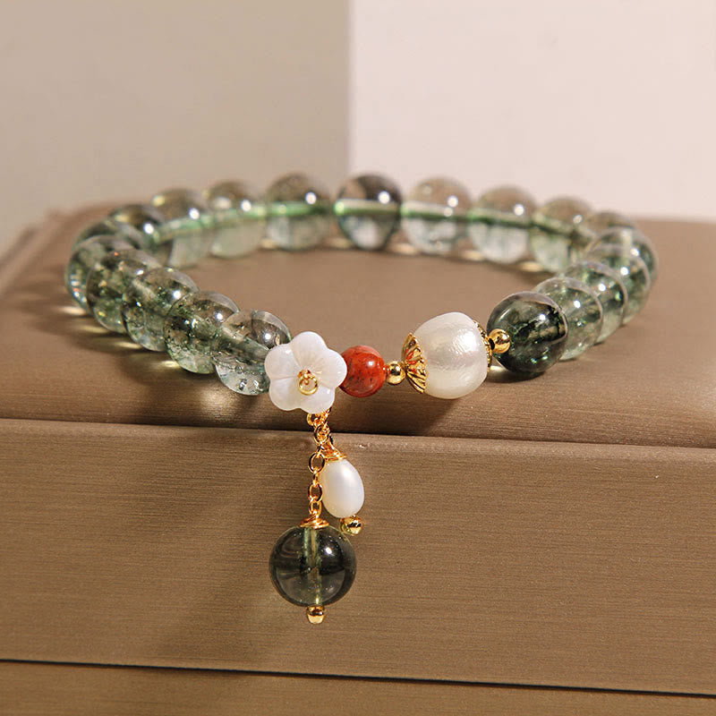 Bracelet Buddha Stones en perles fantômes vertes naturelles, coquillages et fleurs positives