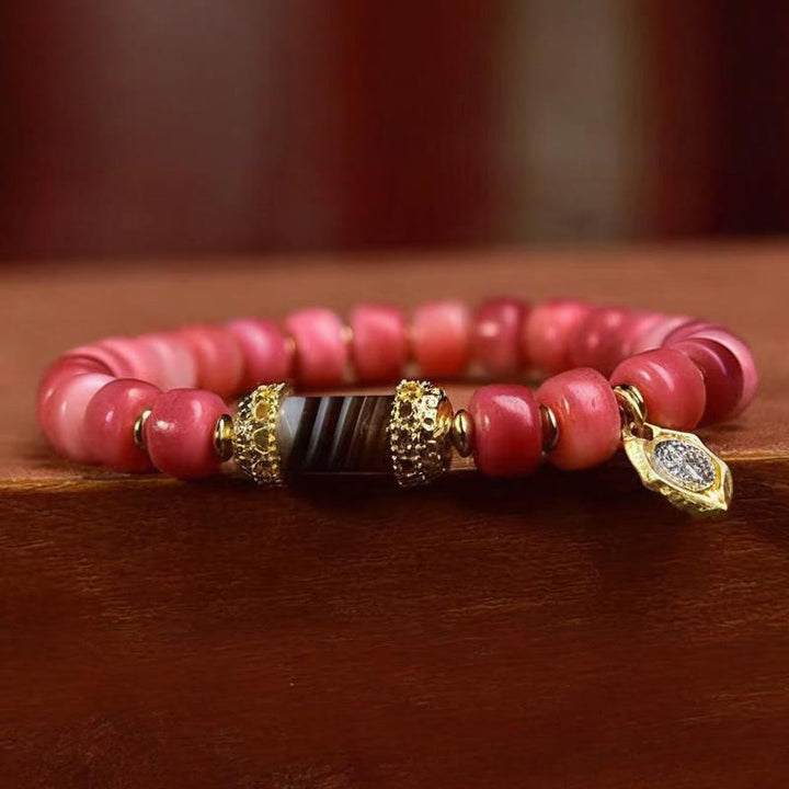 Bracelet porte-bonheur tibétain en Buddha Stones de chameau, cuivre et agate rouge