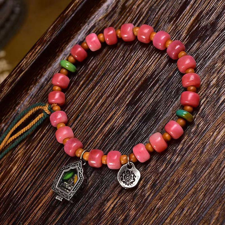Bracelet porte-bonheur tibétain en Buddha Stones de chameau, cuivre et agate rouge
